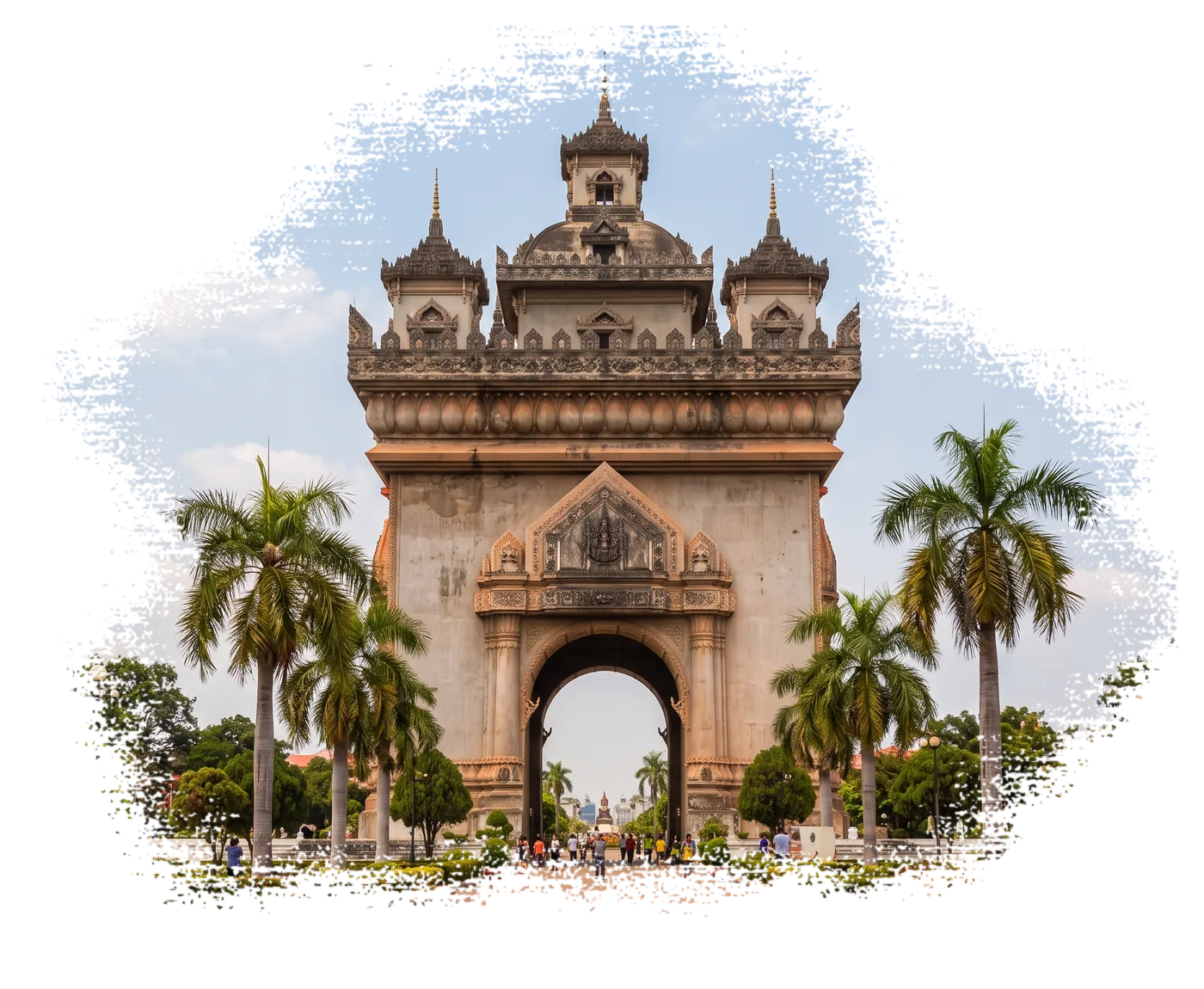 Patuxai victory monument framed by palm trees under a blue sky in Vientiane